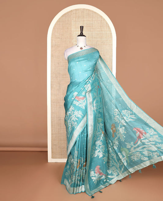 Blue Matka silk saree with polka dots and birds on the branches meenakari design, geometric border, and pallu mirrors the same design