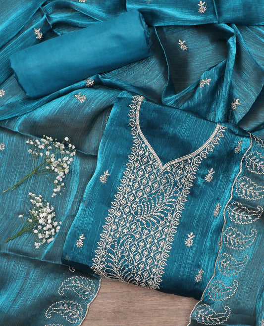 Blue material chudidar set, thread embroidered top, plain bottom, and thread embroidered scallop dupatta