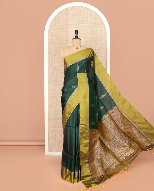 Green Semi Uppada Saree Elegantly Framed with Zari Buttas, Complemented by a Contrasting Border, Richly Detailed Pallu of Ogee Patterns, and Paired with a Contrast Blouse