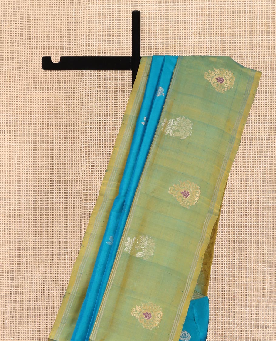 Blue Uppada Silk Saree, Beautified with Floral Buttas All Over Its Body, Complemented by a Contrast Border of Meena Buttas, Pallu of Paisley Butta Enclosed Checks, and Paired with a Contrast Blouse