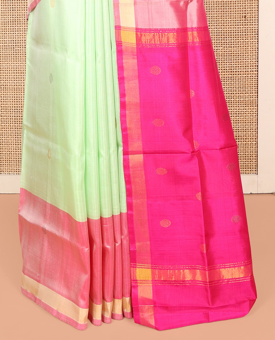 Green Uppada Silk Saree, Decked Up with Buttas, Complemented by a Contrast Buttas Border, Pallu of Zari Designs, and a Contrast Blouse