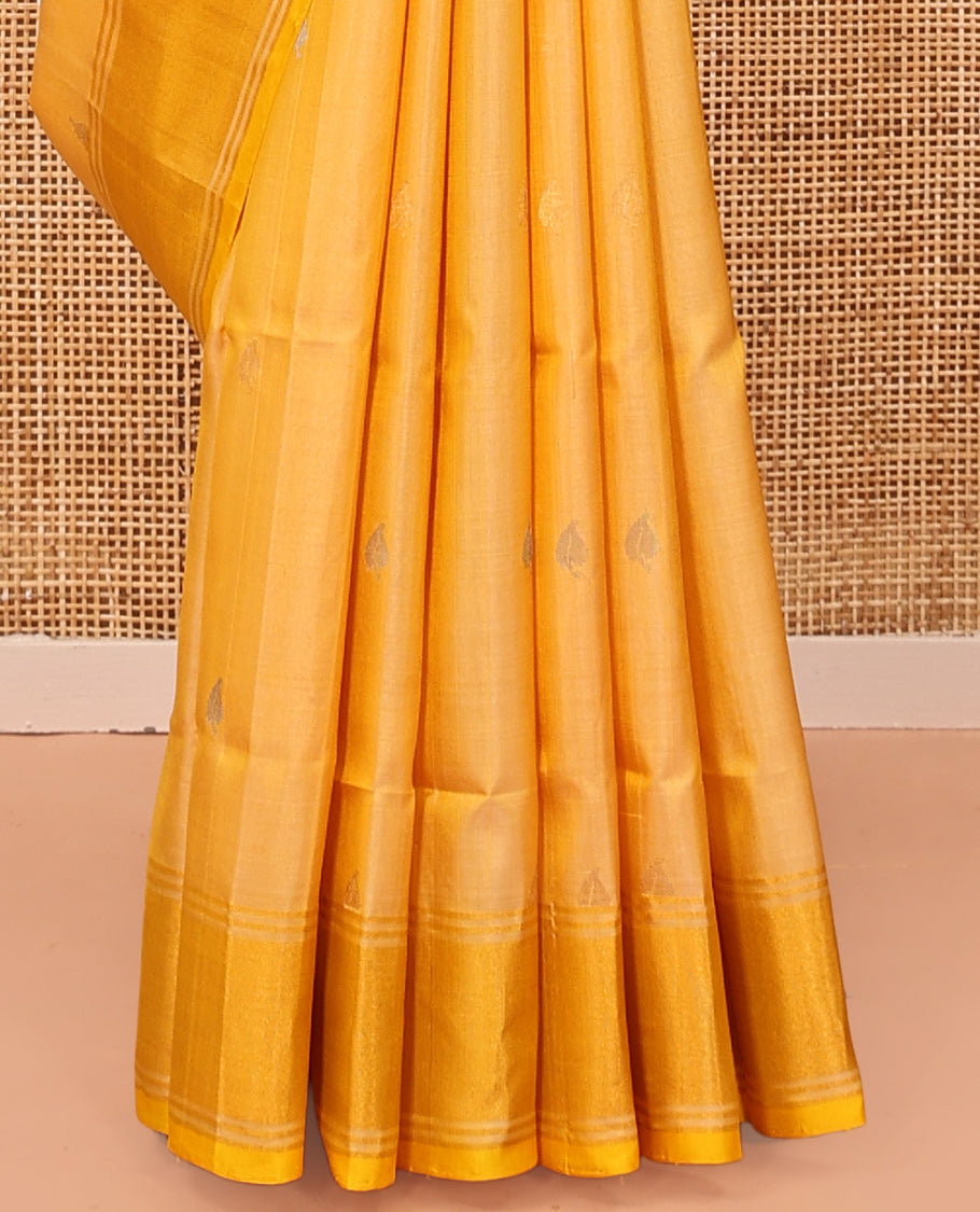 Yellow Uppada Silk Saree, Subtly Sparkled with Buttas, a Contrast Zari Border, Pallu of Mughal-Style Jaal Designs, and a Contrast Blouse