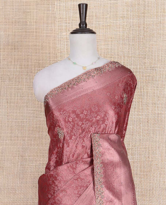 Rose Gold Vastrakala Silk Saree, Finely Crafted with Floral Vine Design and Patch Stone Work, Highlighted by Traditional Zari and Patch Stone Scallop Border, Grand Jaal Design Stone Work Pallu, and Paired with Heavy Embroidered Blouse