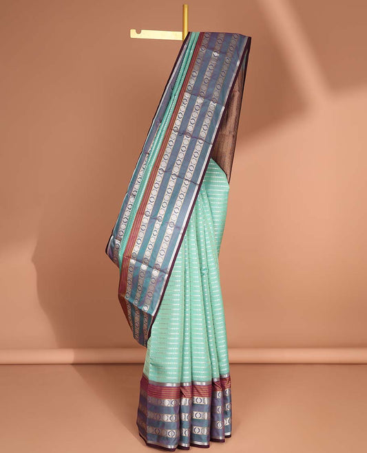 Blue striped floral design vasundhara elite silk saree with contrast traditional zari design border & intricate zari design pallu