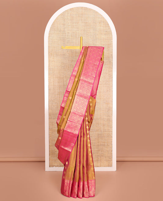 Orange Vasundhara Lite-Silk Mix Saree, Gleamed Up with Zari Buttas All Over Its Body, Complemented by a Contrast Border of Rekku, Muthu, Puli Nagam, Kodivisiry, and Floral Jaal Designs, Grand Pallu, and Paired with a Contrast Blouse