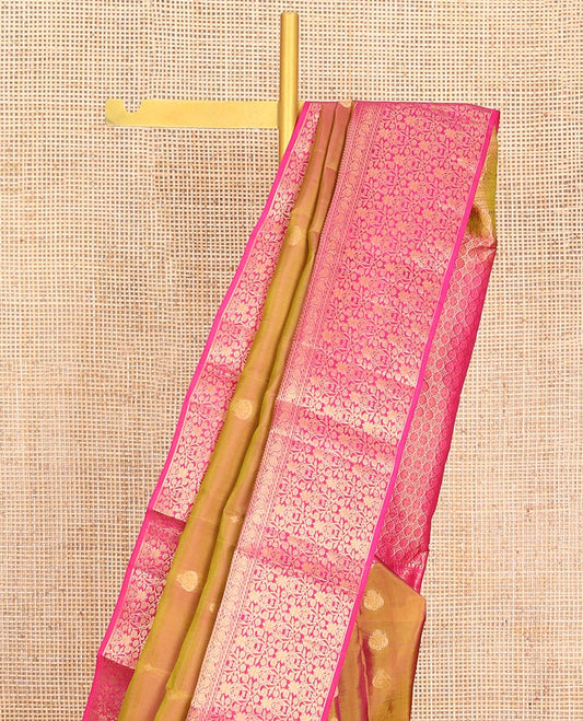 Orange Vasundhara Lite-Silk Mix Saree, Gleamed Up with Zari Buttas All Over Its Body, Complemented by a Contrast Border of Rekku, Muthu, Puli Nagam, Kodivisiry, and Floral Jaal Designs, Grand Pallu, and Paired with a Contrast Blouse