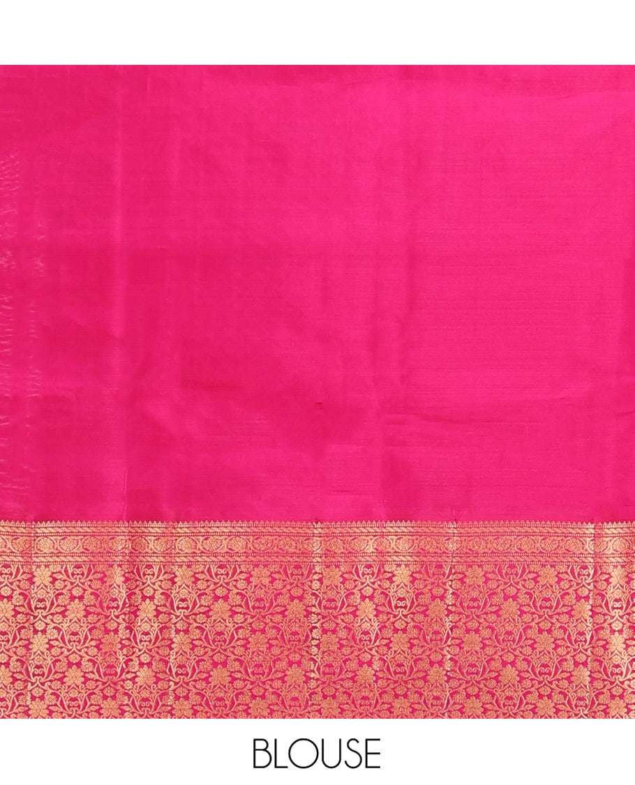 Orange Vasundhara Lite-Silk Mix Saree, Gleamed Up with Zari Buttas All Over Its Body, Complemented by a Contrast Border of Rekku, Muthu, Puli Nagam, Kodivisiry, and Floral Jaal Designs, Grand Pallu, and Paired with a Contrast Blouse