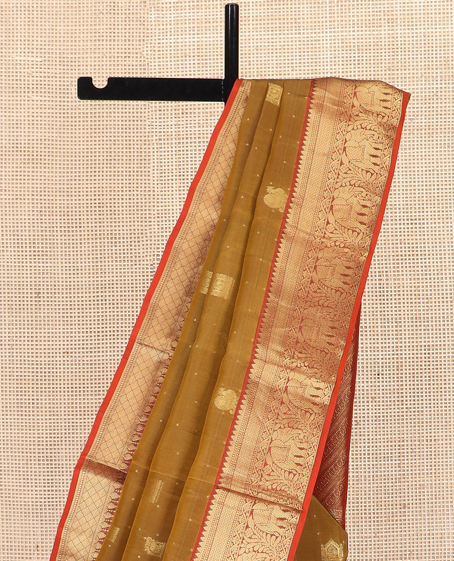 Mustard Vasundhara Lite Silk Mix Saree, Prettified with Zari Buttas All Over Its Body, Complemented by Contrast Border of Rekku, Muthu, Banaras, Mayil Kann, and Yaanai Designs, Grandly Woven Pallu of Diagonal Designs, and Paired with a Contrast Blouse