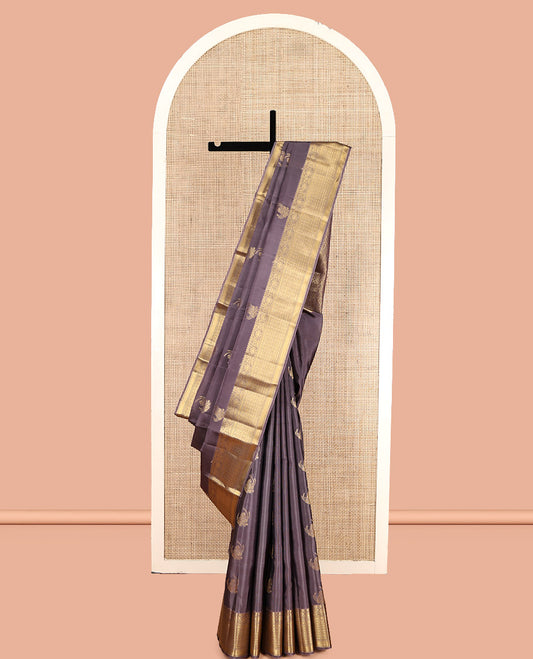 Grey Vasundhara Lite Silk Mix Saree, Adorned with Zari Buttas, Highlighted by Traditional Zari Border, Intricate Pallu, and Matching Blouse