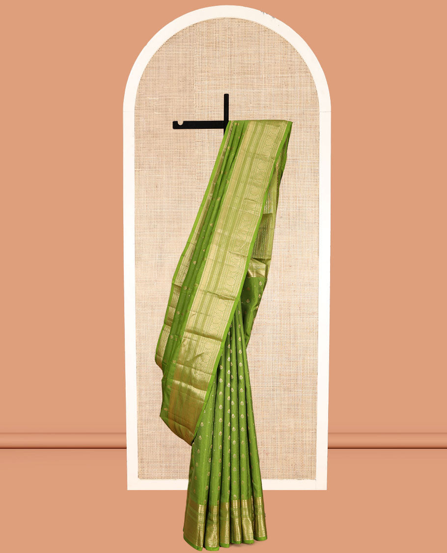 Green Vasundhara Lite Silk Mix Saree, Subtly Sparkled with Zari Buttas and Stripes, a Zari Border of Muthu, Kamalam, and Kodi Visiry, Jaal Pallu, and a Matching Blouse