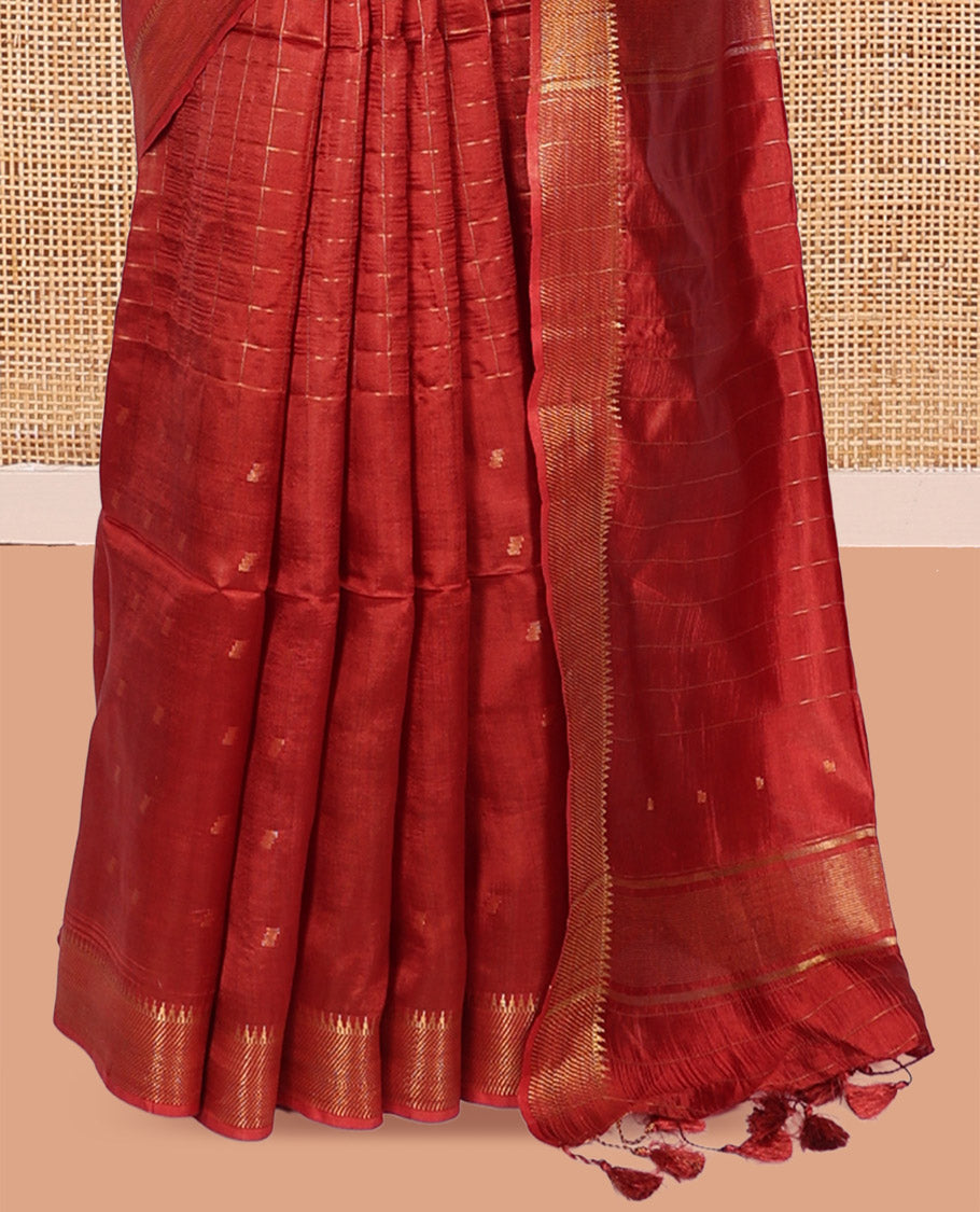 Rust Banana Pith Saree, Gleamed Up with Checks and Buttas, a Zari Temple Border, Striped Pallu, and Matching Blouse
