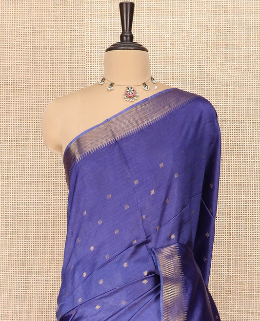 Ink Blue Banana Pith Saree Prettified with Zari Buttas, Temple Border of Zari Designs, Subtle Pallu of Zari Designs, and Paired with a Matching Blouse