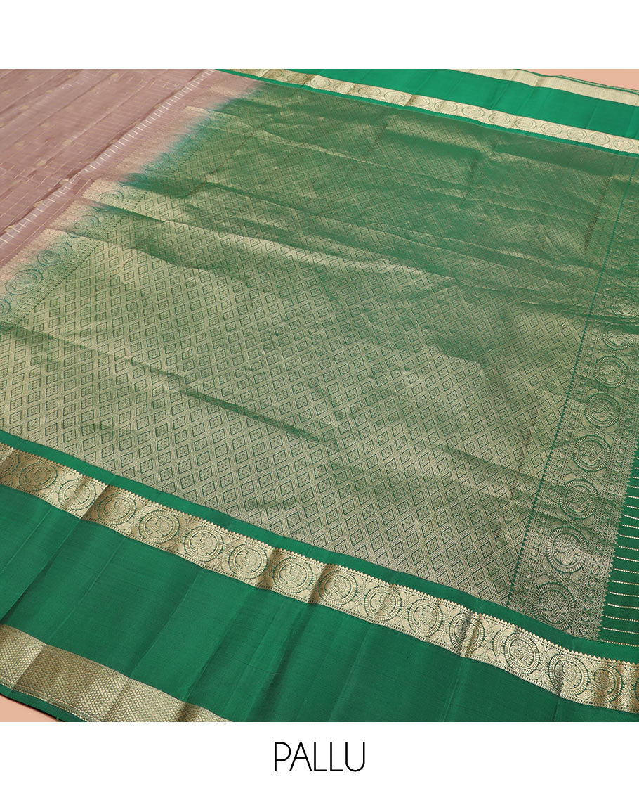 Brown Vasundhara Silk Saree Gleamed Up with Zari Butta Enclosed Checks, Complemented by a Contrast Rettai Pettu Blouse of Rekku, Round Mayil, Neli, and Mayil Kann Designs, Pallu Embellished with Jaal Designs, and Paired with a Contrast Blouse