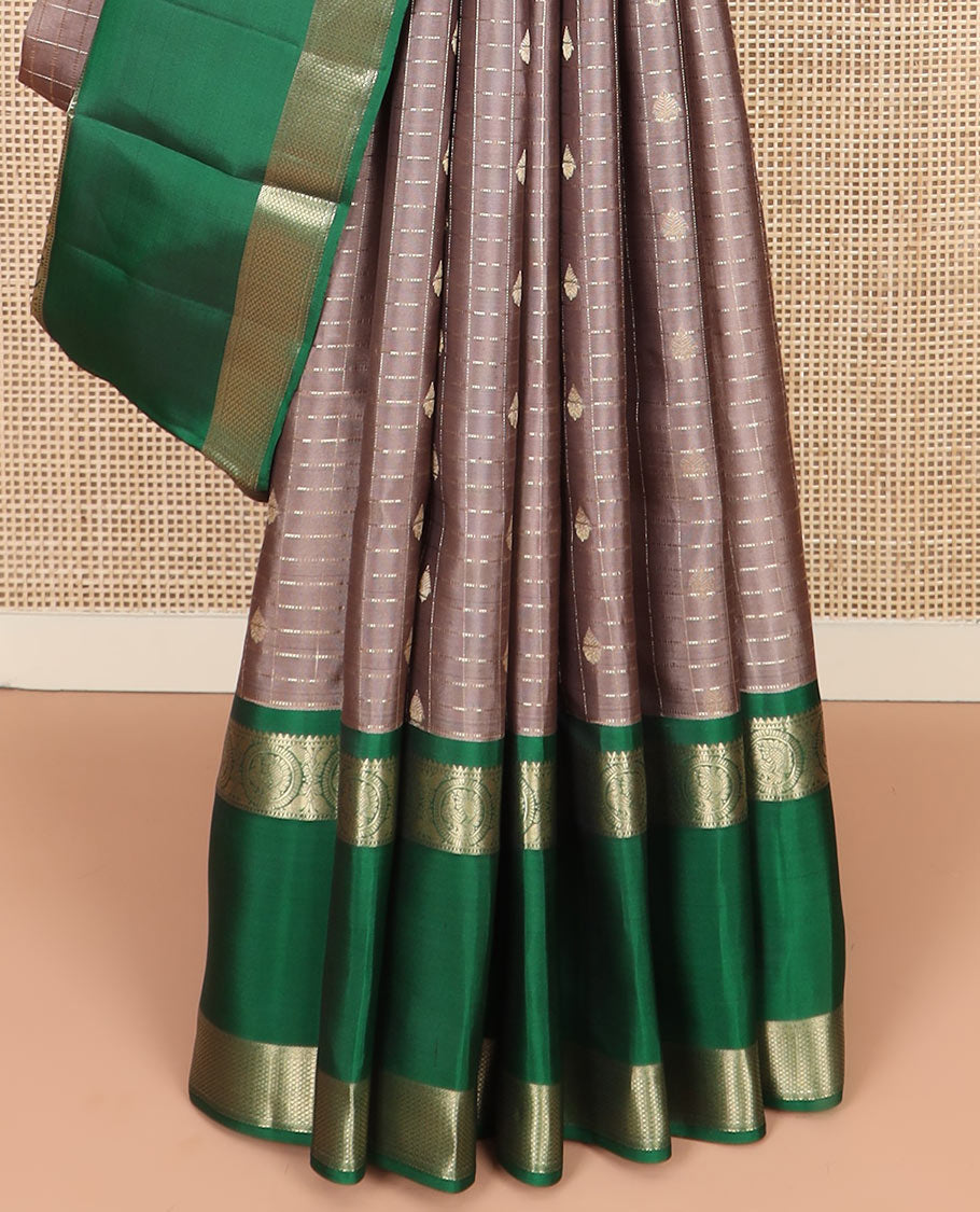 Brown Vasundhara Silk Saree Gleamed Up with Zari Butta Enclosed Checks, Complemented by a Contrast Rettai Pettu Blouse of Rekku, Round Mayil, Neli, and Mayil Kann Designs, Pallu Embellished with Jaal Designs, and Paired with a Contrast Blouse