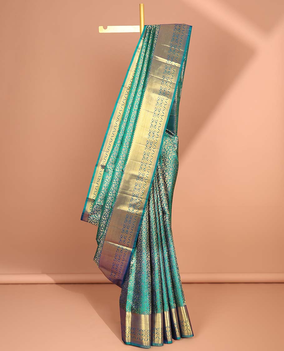 Green floral jacquard kancheepuram silk aree with self intricate zari border & argyle zari design pallu