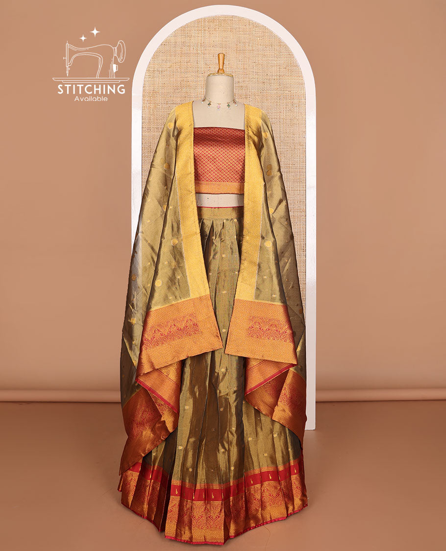 Olive green buttas tissue half saree with contrast zari design border, checked zari design blouse & floral design dhavani