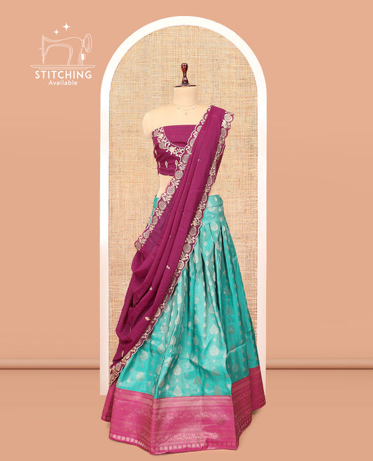 Blue Banarasi Half-Saree, Accentuated with Buttas Skirt, a Contrast Traditional Border, Contrast Embroidered Blouse, and Contrast Scallop Embroidered Dupatta