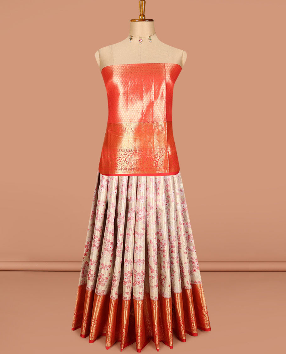 Peach art silk half saree, meenakari floral jacquard with contrast traditional zari border jacquard contrast blouse, and zari woven dhavani