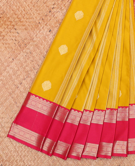 Yellow Budget Silk Saree, Embellished with Zari Buttas and Stripes on Its Body, Complemented by a Contrast Traditional Rettai Pettu Border, Grand Jaal Pallu, and Paired with a Contrast Blouse