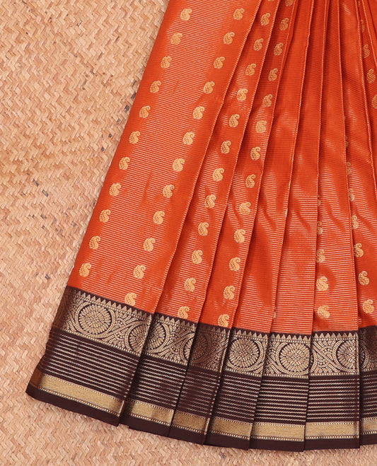 Orange Budget Silk Saree Accentuated with Zari Stripes and Paisley Buttas, Featuring a Contrast Traditional Zari Border with Floral Creeper Designs, Enriched with an Intricately Designed Pallu, and Paired with a Contrast Zari-Bordered Blouse