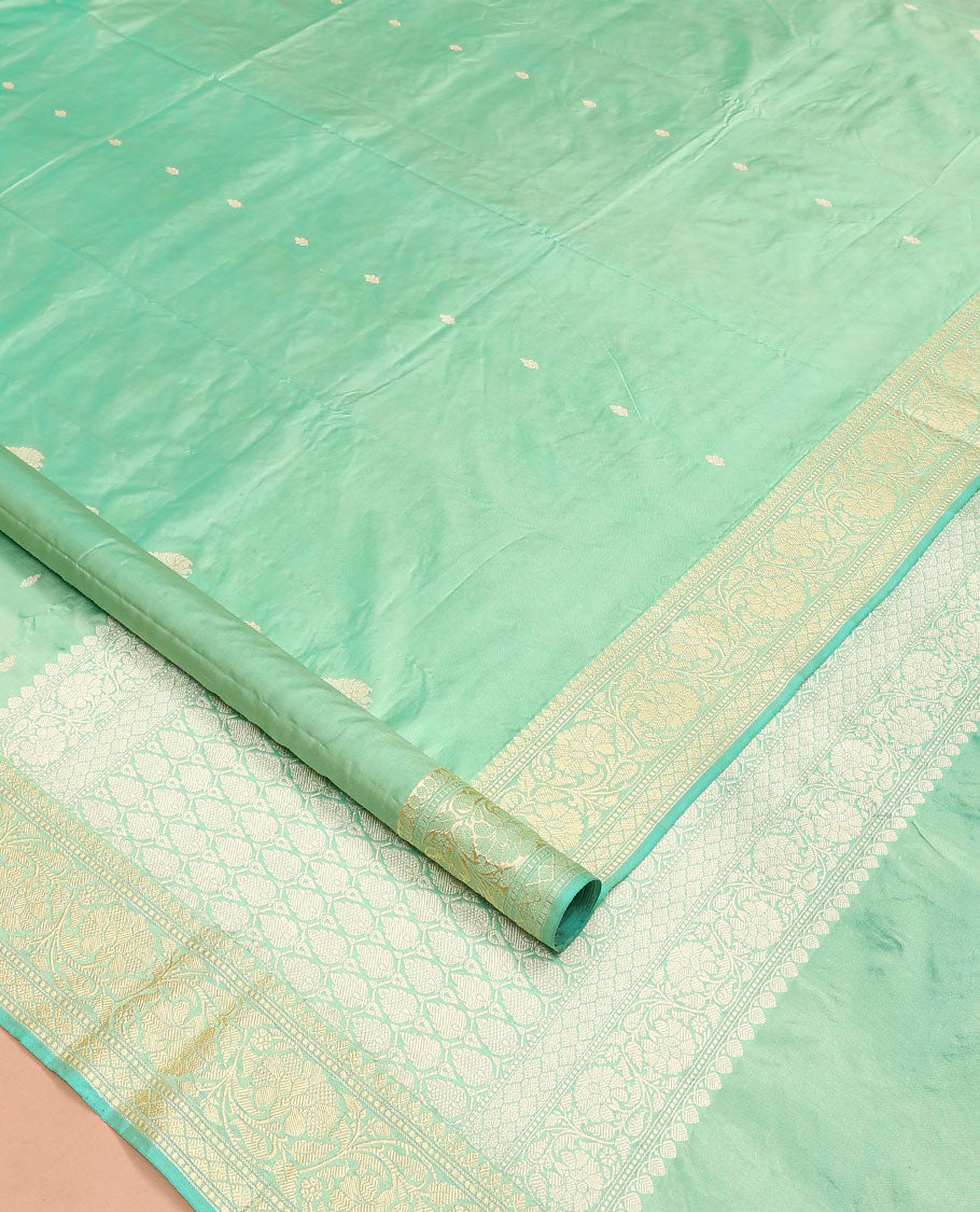 Green buttas kathan silk saree, floral creeper border, and intricately woven pallu