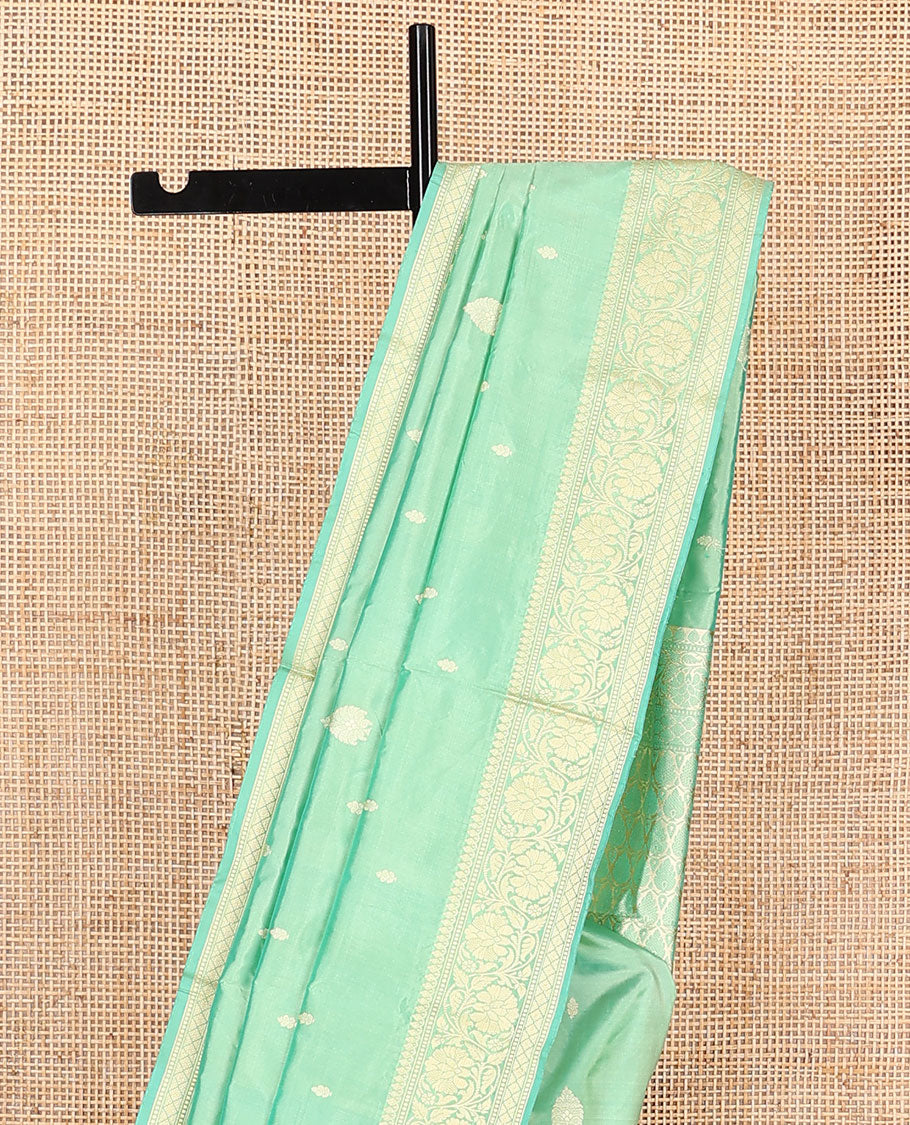 Green buttas kathan silk saree, floral creeper border, and intricately woven pallu