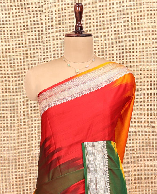 Multi-Color Banarasi Silk Saree, Mesmerized with Colorful Ikkat Weave on Its Body, Highlighted by a Self-Border of Traditional Designs, Pallu of Big Paisley Designs, and Paired with a Matching Jacquard Blouse