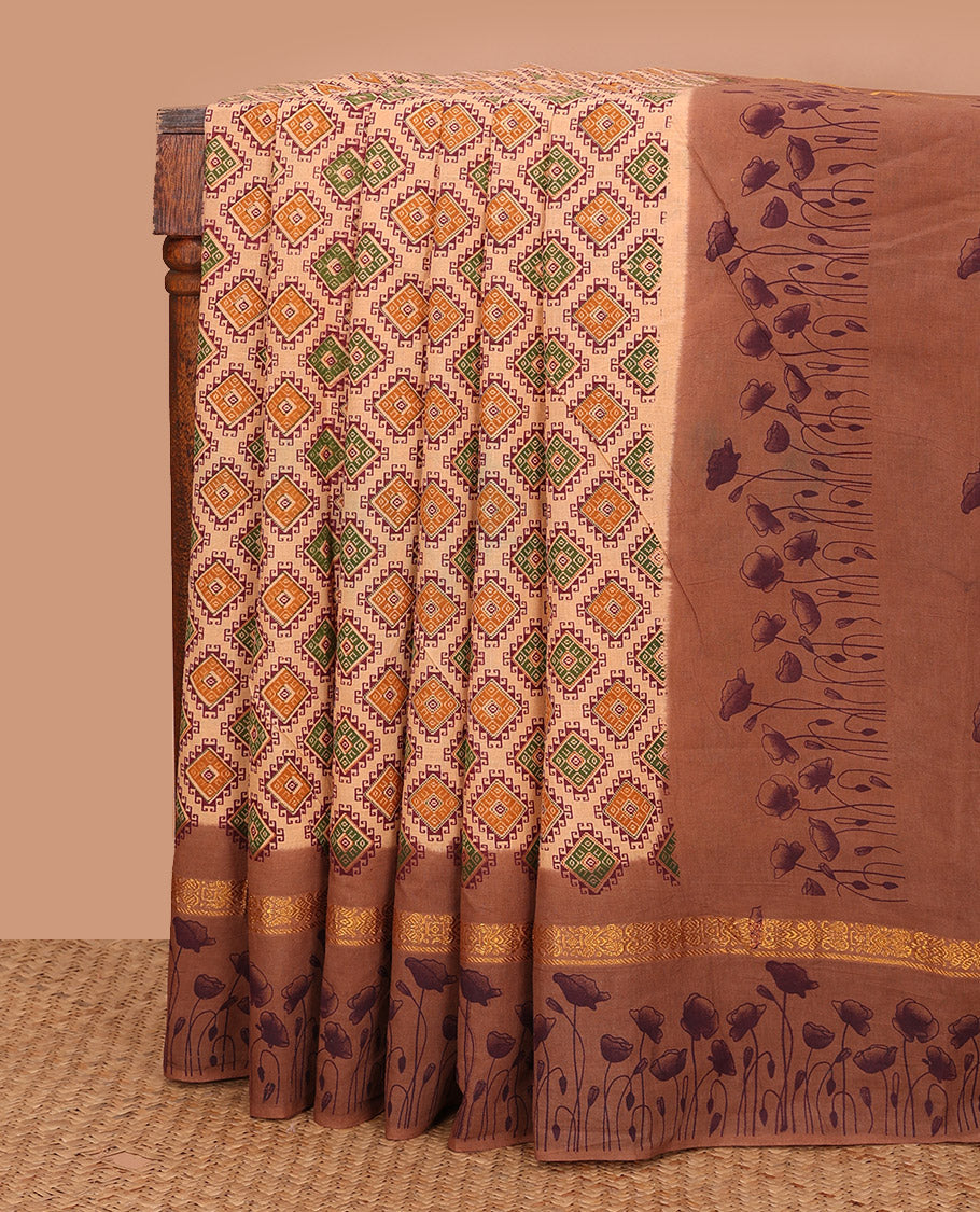 Light Orange Sungudi Cotton Saree Prettified with Diamond Buttas Print, Highlighted by Contrast Zari and Print Work Border of Floral Motifs, and Floral Printed  Pallu