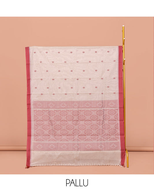 Off-White Kanchi Cotton Saree, Delicately Woven with Buttas All Over Its Body, Complemented by Contrast Border, Geometric Patterned Pallu and Paired with a Matching Blouse