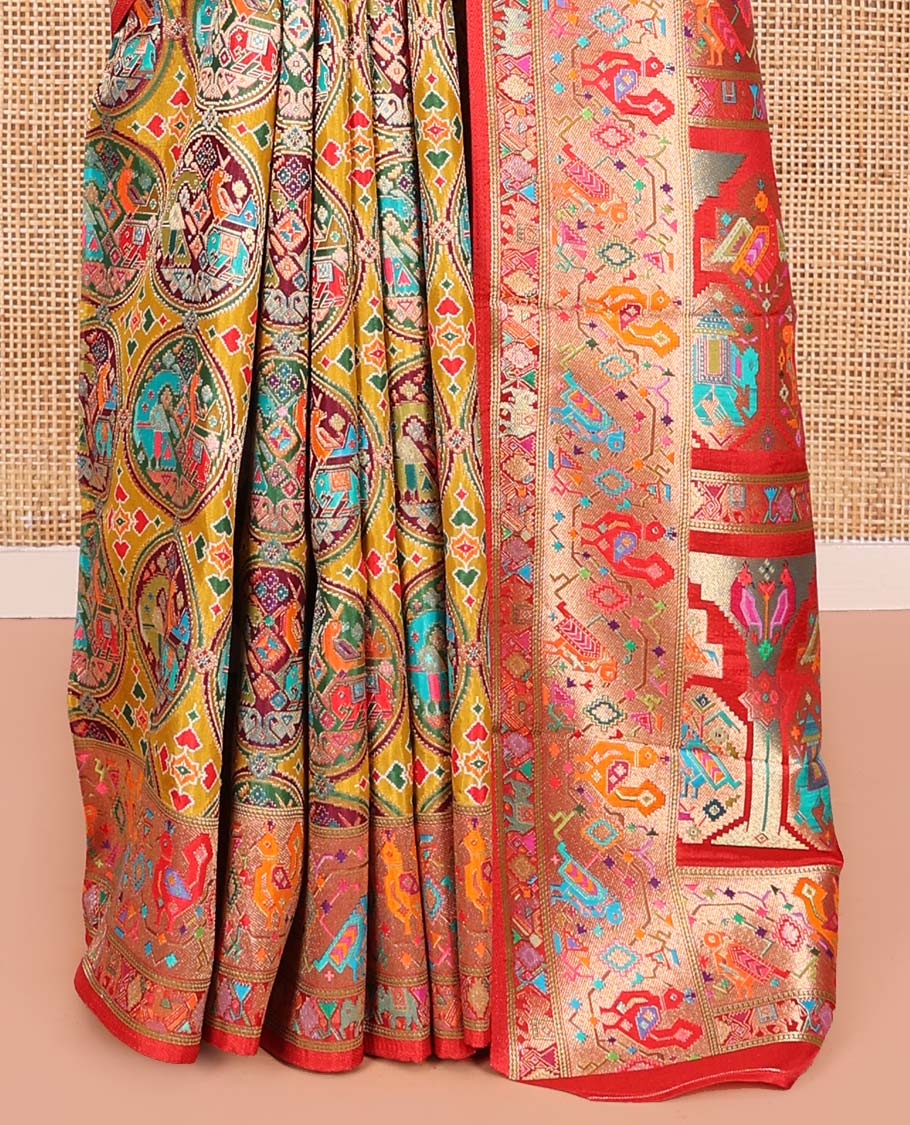 Multi-Color Dola Silk Saree, Artfully Printed with Colorful Patola-Style Animal Motifs on Its Body, Complemented by Contrast Patola-Style Zari and Print Border, Pallu of Paisleys, and Paired with a Contrast Blouse