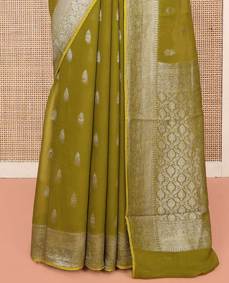 Green Georgette Saree, Steeped with Buttas, Highlighted by a Traditional Floral Creeper Border, Intricately Designed Pallu, and  a Matching Blouse