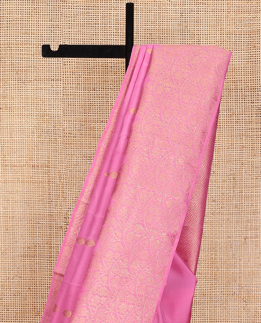 Pink zari buttas Kanchipuram silk saree, scallop floral design zari border, and pallu of zari-rich jaal design
