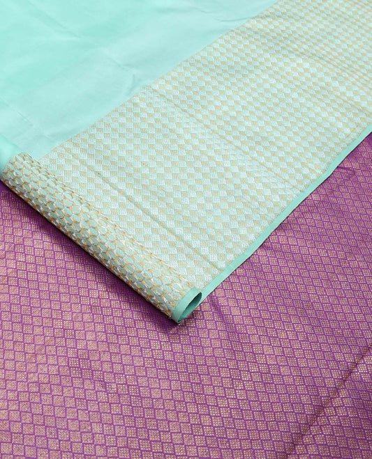 Turquoise zari buttas Kanchipuram silk saree,  zari border of jaal designs, and contrast jaal pallu