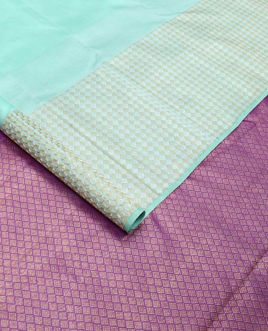 Turquoise zari buttas Kanchipuram silk saree,  zari border of jaal designs, and contrast jaal pallu