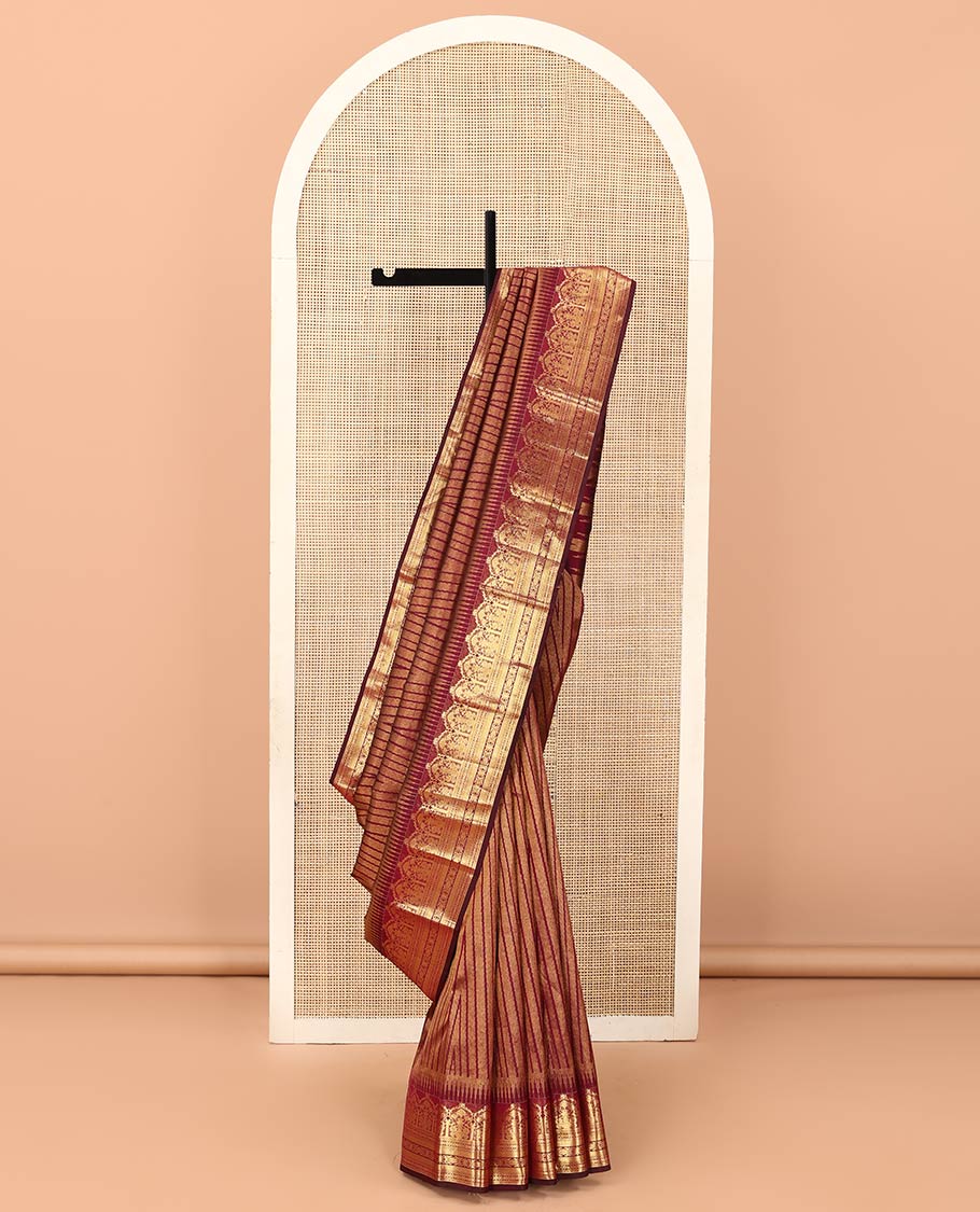 Maroon temple jacquard Kanchipuram designer saree, rekku border of floral bouquet, and traditional designs, and thazampoo rekku pallu