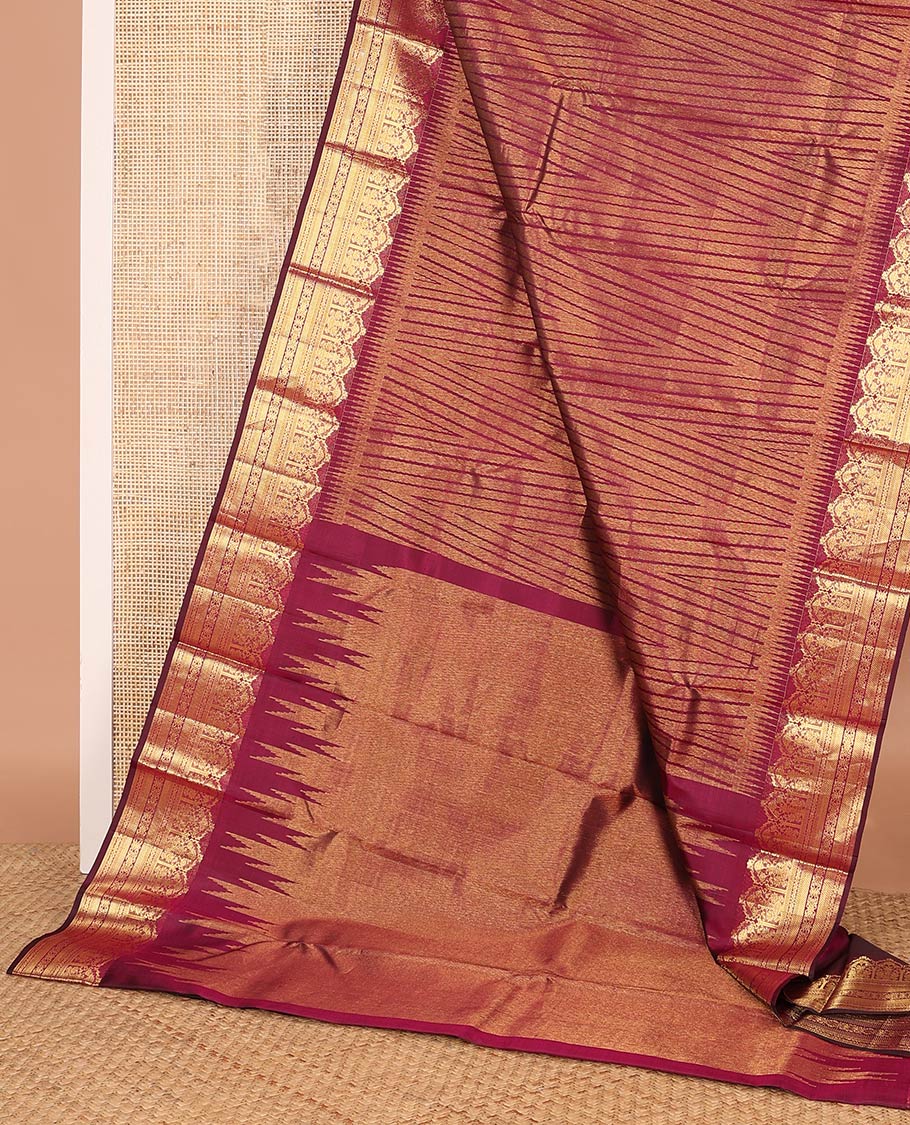 Maroon temple jacquard Kanchipuram designer saree, rekku border of floral bouquet, and traditional designs, and thazampoo rekku pallu