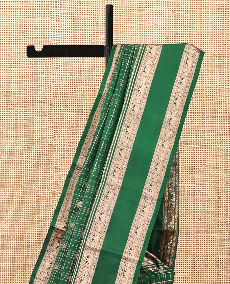 Green Kanchipuram Silk Saree, Detailed with Buttas and Checks, a Zari Rettai Pettu Border of Thazampoo Rekku, and Mayil Designs, Grand Pallu, and a Matching Blouse