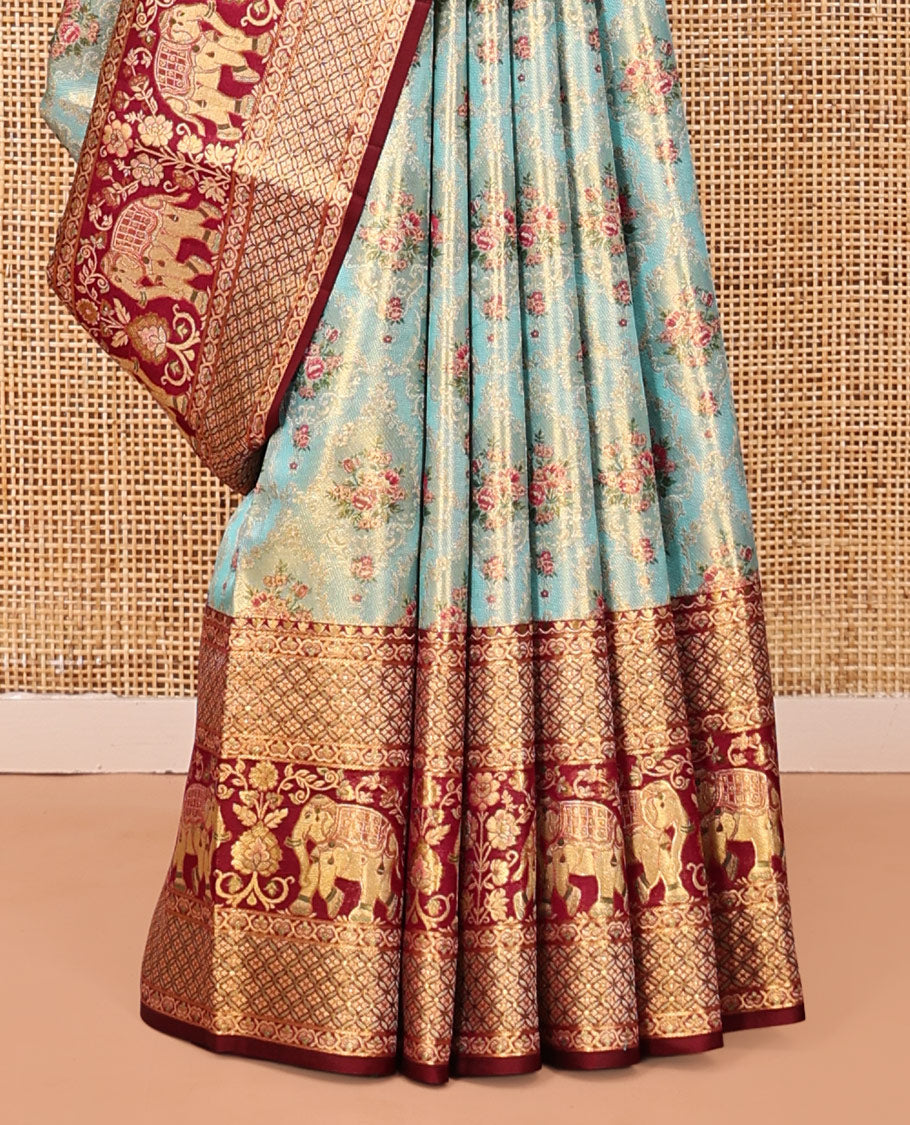 Blue Kanchipuram Tissue Silk Saree, Artfully Detailed with Floral Jacquard, Complemented by a Contrast Border of Jaal and Elephant Designs, Jaal Pallu, and a Contrast Blouse