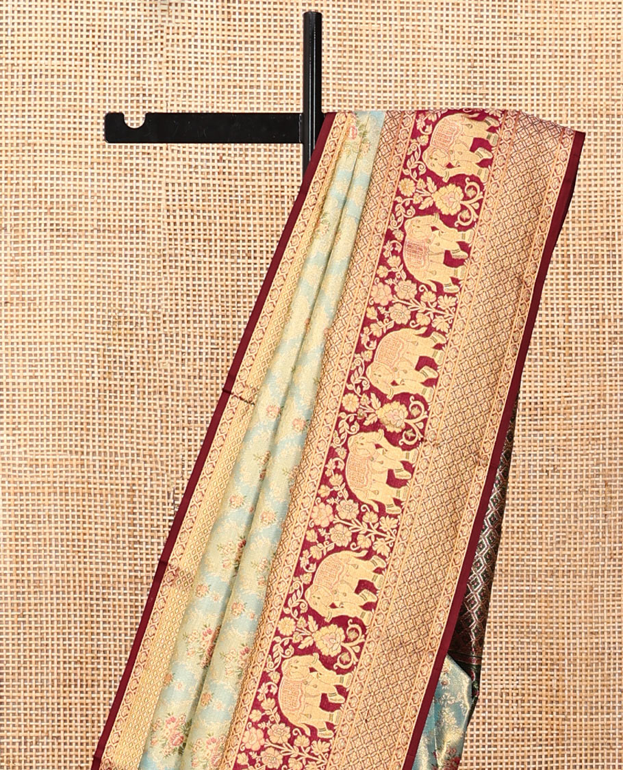 Blue Kanchipuram Tissue Silk Saree, Artfully Detailed with Floral Jacquard, Complemented by a Contrast Border of Jaal and Elephant Designs, Jaal Pallu, and a Contrast Blouse