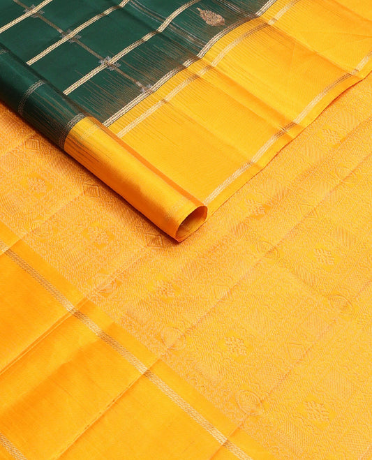 Green buttas enclosed checked soft silk saree, contrast rettai pettu border & pallu of butta enclosed checks