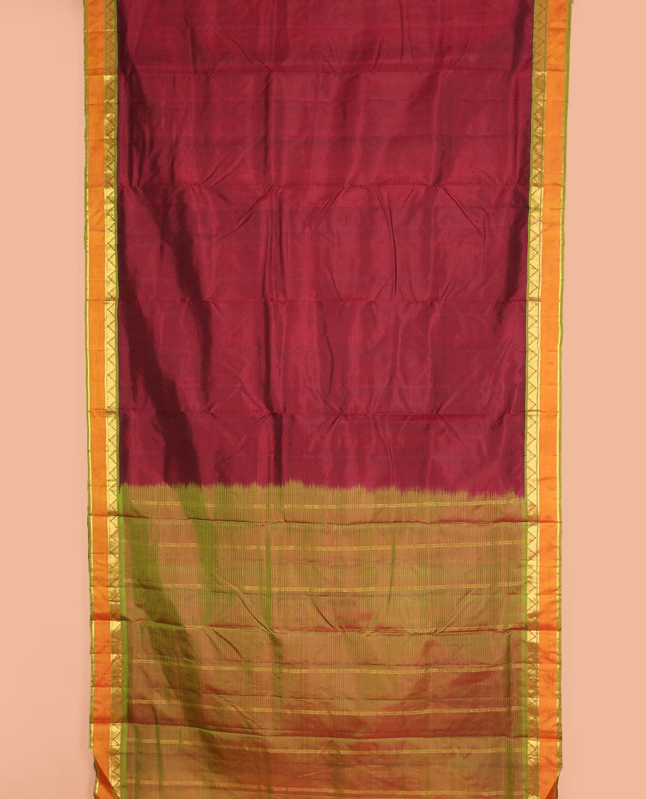 Maroon plain ten-yard silk saree, contrast rettai pettu border of thazampoo rekku, manga & kathir designs & striped pallu