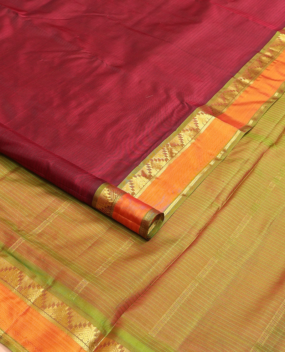 Maroon plain ten-yard silk saree, contrast rettai pettu border of thazampoo rekku, manga & kathir designs & striped pallu