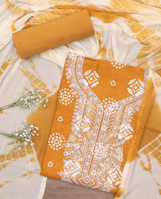 Yellow material churidar set, batik printed with neck embroidered cotton top, plain cotton bottom, and shibori printed chiffon dupatta