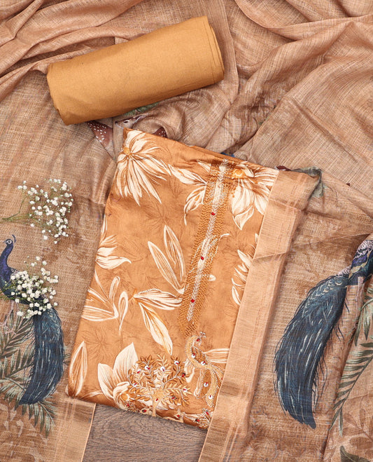 Orange Material Chudidar Set, Prettified with Floral Print, and Embroidery on Its Muslin Top, a Plain Cotton Bottom, and Paired with a Peacock Printed Lilan Cotton Dupatta