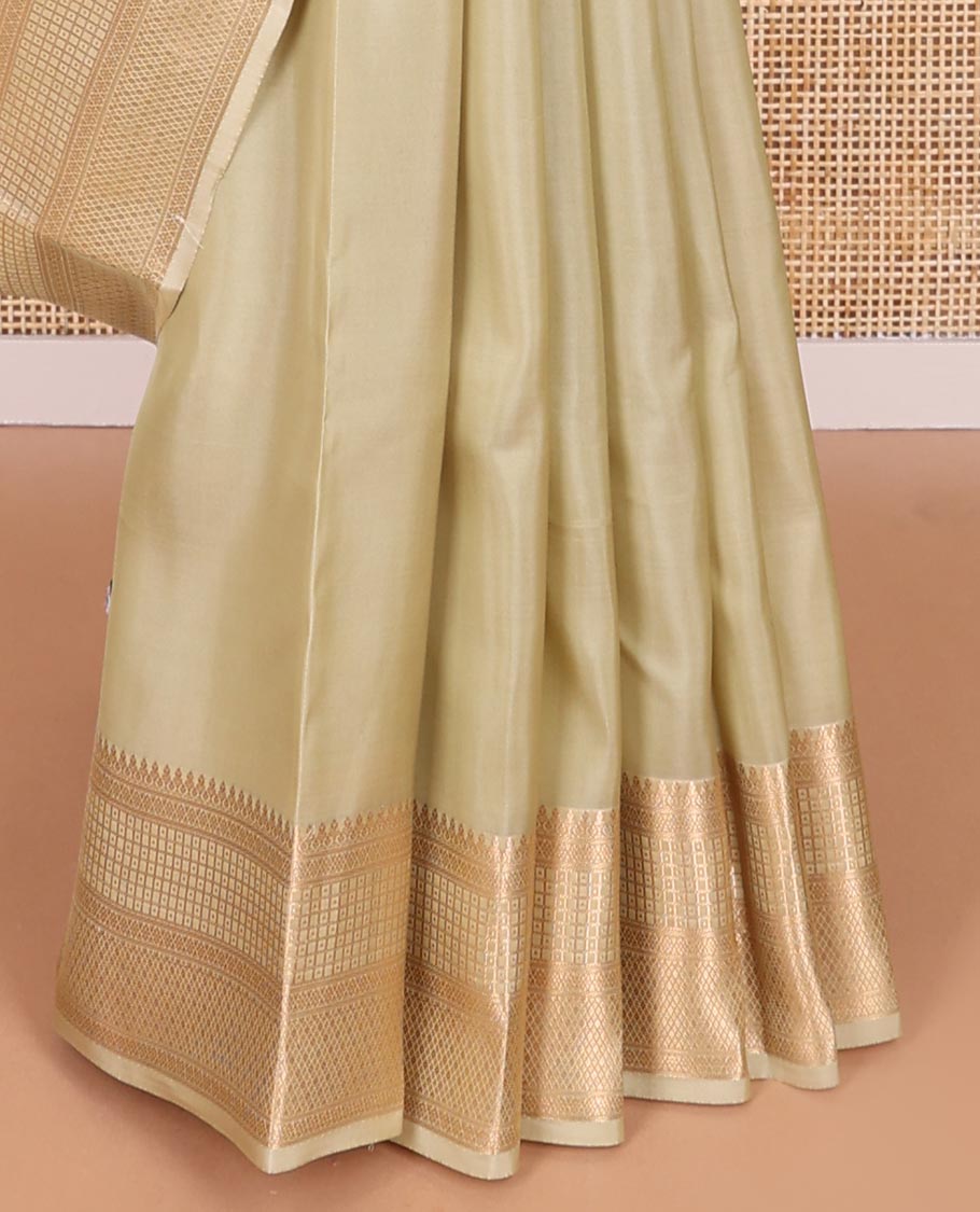 Beige buttas vasundhara elite silk saree with self traditional zari design border & argyle design pallu