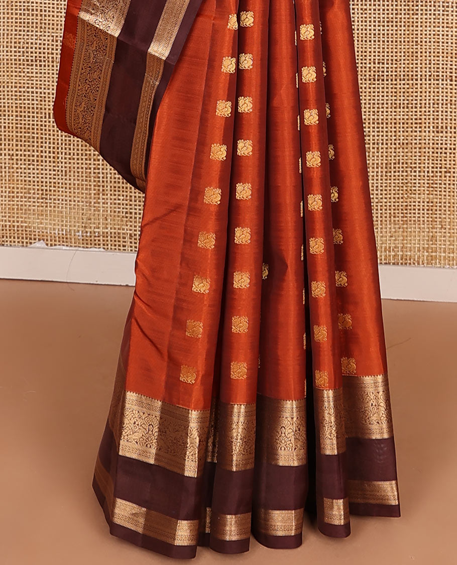 Rust Orange Vasundhara Lite-Silk Mix Saree Showcasing Mayil Buttas, Complemented with a Contrast Rettai Pettu Border Featuring Muthu, Diamond, and Mayil Designs, Adorned with Jaal Pallu, and a Contrast Blouse