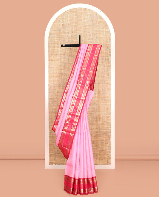 Pink Vasundhara Lite Silk Mix Saree, Sparsely Sparked with Zari Buttas All Over Its Body, Complemented by Contrast Border of Muthu, Banaras, Kathir, Mayil, and Chakram Designs, Grand Jaal Pallu, and Paired with a Contrast Blouse