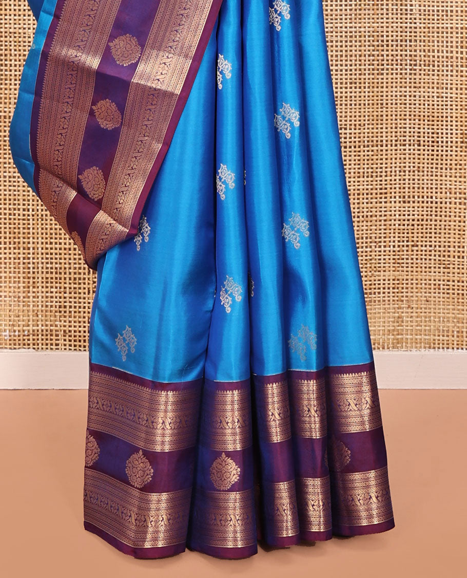 Blue Vasundhara Lite Silk Mix Saree, Elevated with Zari Buttas All Over Its Body, Complemented by a Contrast Border of Rekku, Diamond, Cross Kamalam and Zari Designs, Grand Floral Design Pallu, and Paired with a Contrast Blouse