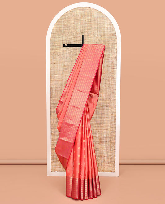 Peach Vasundhara Lite Silk Mix Saree, Adorned with Mayil and Chakram Buttas All Over Its Body, Complemented by Contrast Traditional Zari Designs Woven Border, Grand Geometric Patterned Pallu and Paired with a Contrast Blouse