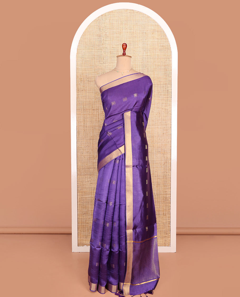Violet Banana Pith Saree Spotlighted with Square Zari Buttas All Over Its Body, Bavanji Border, Gleaming Zari Striped Pallu, and Paired with a Matching Plain Blouse